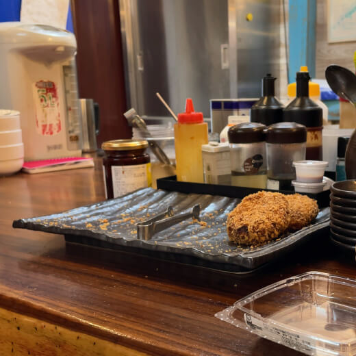 純’sコッチン　カウンターのキムチコロッケ